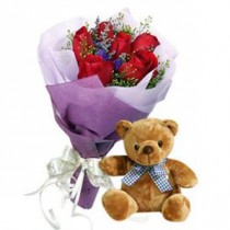 Teddy bear with roses
